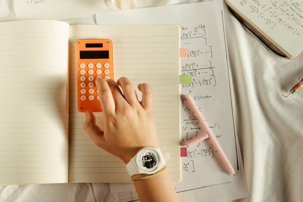 Student working on calculator